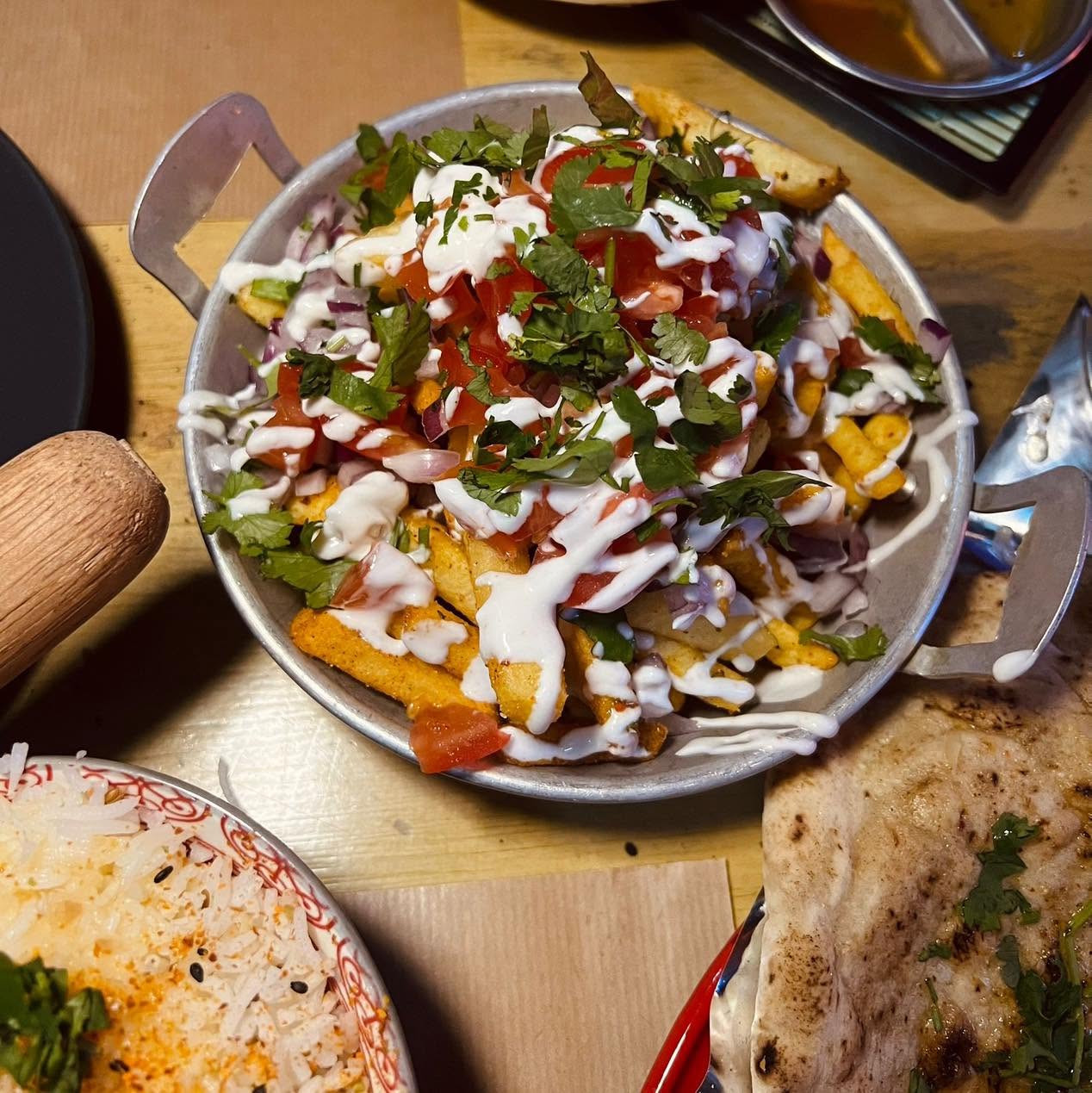 Masala fries dusted with spices and fresh herbs